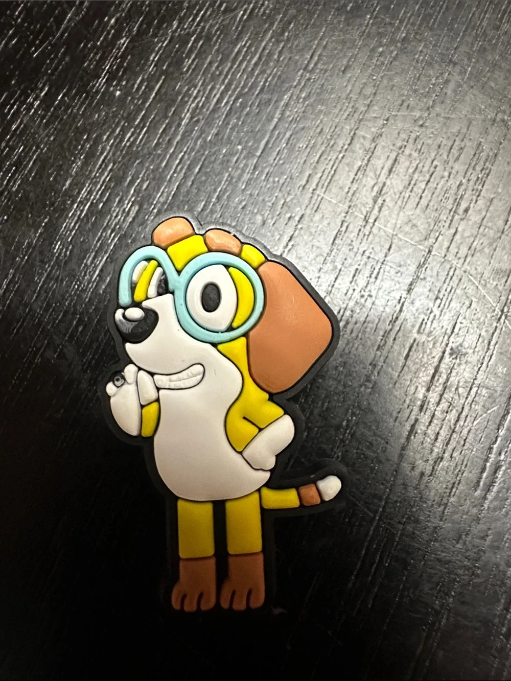 Bluey character shoe charms. Honey I believe.